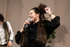 Saska Saskahar of Balkanarama warming up the audience for the evening's fundraising ceilidh organised on behalf of the Ceilidh Collective