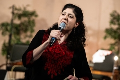 Nada Shawa addressing the audience at the Ceilidh Collective's fundraiser for Medical Aid for Palestinians