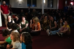 Audience members watching the stage during the Ceilidh Collective's Gaza fundraiser