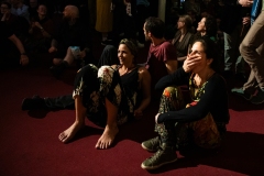 Audience members watching the stage during the Ceilidh Collective's Gaza fundraiser