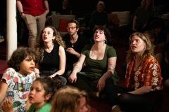 Audience members watching the stage during the Ceilidh Collective's Gaza fundraiser